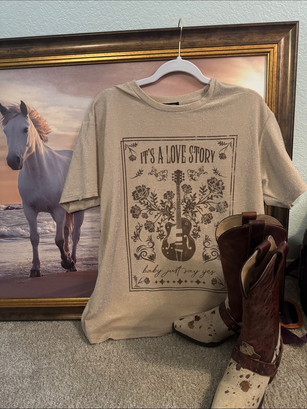 Graphic T-shirt  “It’s a Love Story” Gold sparkle.